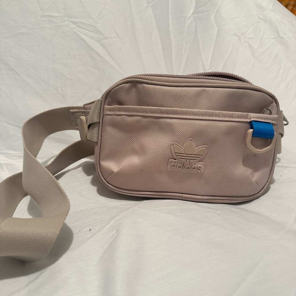 adidas pale pink belt bag with blue accent